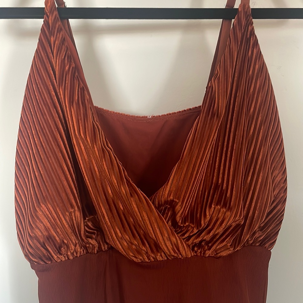 Orange ribbed suede body suit
